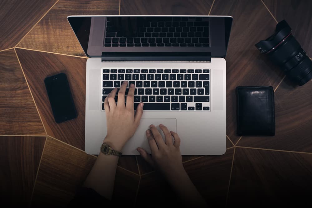 Writing Website Copy on Laptop
